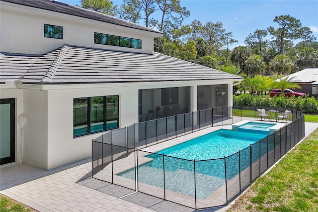 3632 Golden Gate Blvd W, Naples, FL 34102 - view of pool featuring a patio, a sunroom, and a pool with connected hot tub