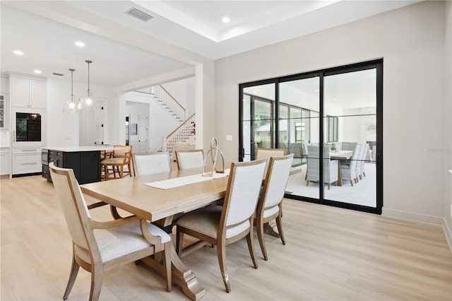 3632 Golden Gate Blvd W, Naples, FL 34102 - dining area featuring stairs, light wood finished floors, recessed lighting, and baseboards