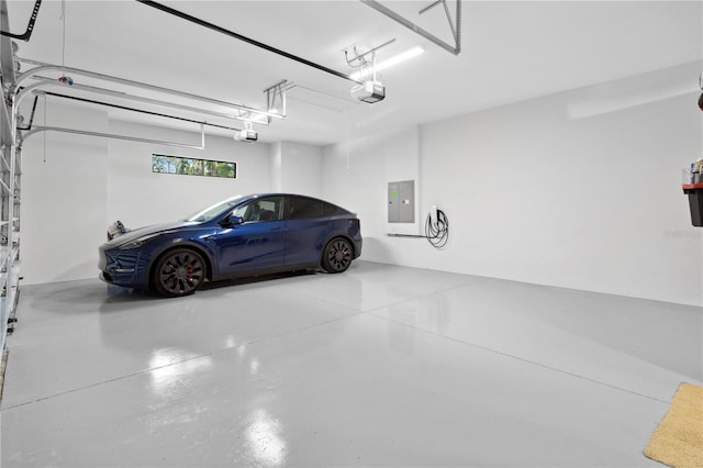 3632 Golden Gate Blvd W, Naples, FL 34102 - garage with electric panel and a garage door opener