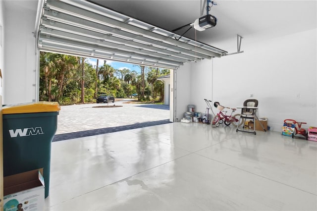 3632 Golden Gate Blvd W, Naples, FL 34102 - garage featuring a garage door opener