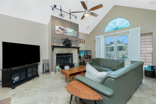 5219 Guava Ter, Port Charlotte, FL 33981 - living room featuring high vaulted ceiling, ceiling fan, and a fireplace