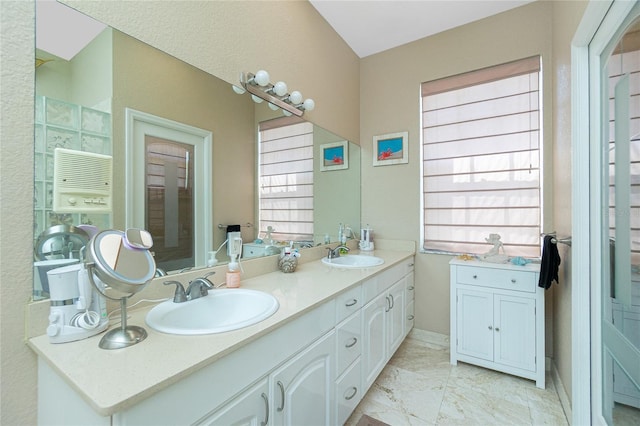 5219 Guava Ter, Port Charlotte, FL 33981 - bathroom featuring double vanity and marble finish floors