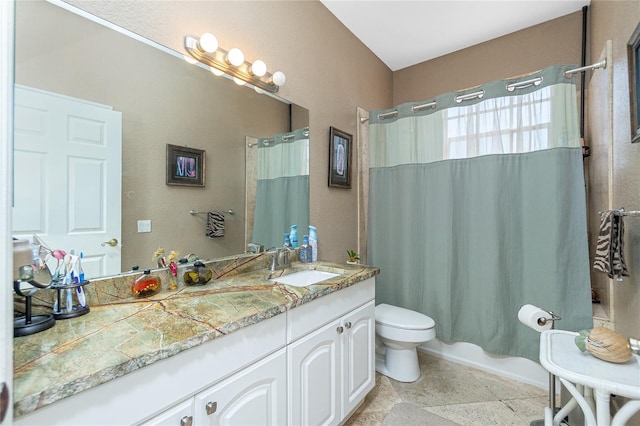 5219 Guava Ter, Port Charlotte, FL 33981 - bathroom with vanity, toilet, and shower / tub combo with curtain