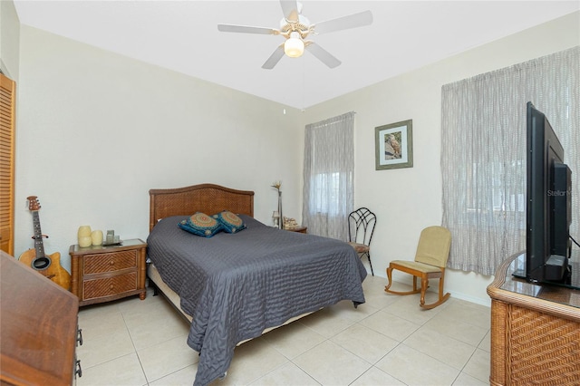 5219 Guava Ter, Port Charlotte, FL 33981 - bedroom featuring light tile patterned flooring, ceiling fan, and baseboards