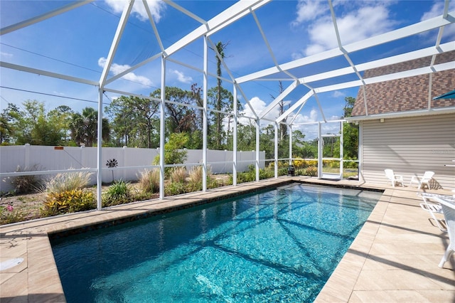 5219 Guava Ter, Port Charlotte, FL 33981 - view of swimming pool featuring a patio area and glass enclosure