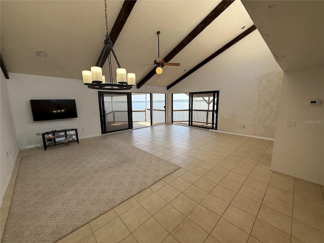 25188 Marion Ave Unit 1, Punta Gorda, FL 33950 - unfurnished living room with light tile patterned floors, beamed ceiling, high vaulted ceiling, baseboards, and a ceiling fan