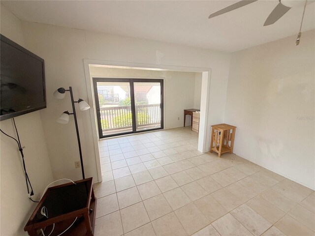 25188 Marion Ave Unit 1, Punta Gorda, FL 33950 - spare room with a ceiling fan and light tile patterned floors