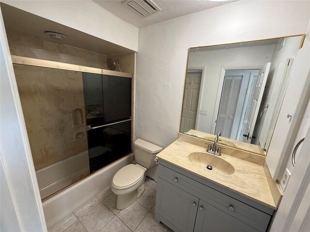 25188 Marion Ave Unit 1, Punta Gorda, FL 33950 - bathroom with vanity,  shower combination, and toilet