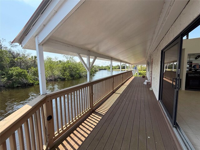 25188 Marion Ave Unit 1, Punta Gorda, FL 33950 - wooden deck featuring a water view