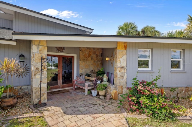 5600 Blackjack Ct S, Punta Gorda, FL 33982 - doorway to property with stone siding