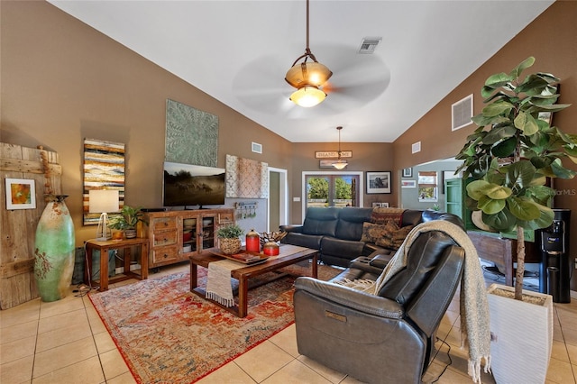 5600 Blackjack Ct S, Punta Gorda, FL 33982 - living room featuring tile patterned floors, a ceiling fan, and high vaulted ceiling