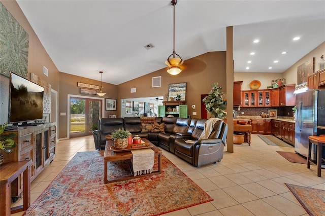 5600 Blackjack Ct S, Punta Gorda, FL 33982 - living area featuring light tile patterned floors, high vaulted ceiling, recessed lighting, and a ceiling fan