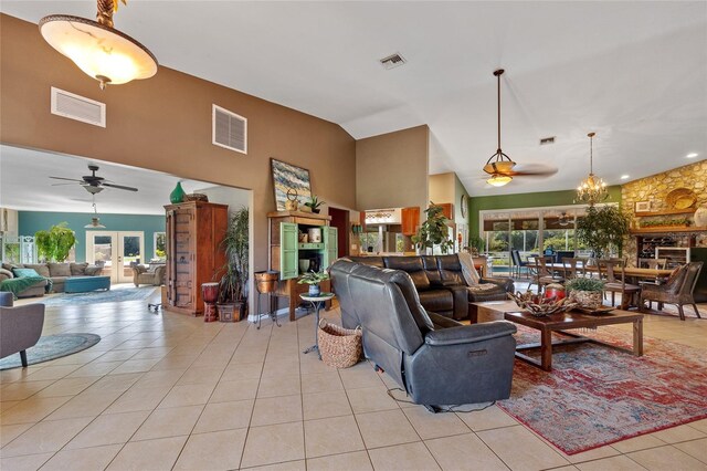 5600 Blackjack Ct S, Punta Gorda, FL 33982 - living area with ceiling fan, light tile patterned floors, plenty of natural light, and high vaulted ceiling