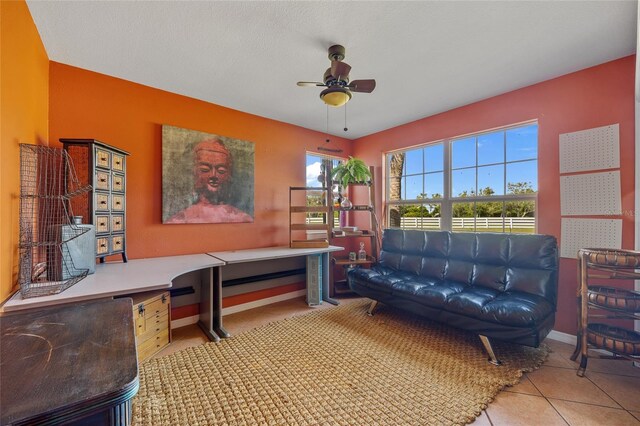 5600 Blackjack Ct S, Punta Gorda, FL 33982 - home office with ceiling fan, tile patterned floors, and baseboards