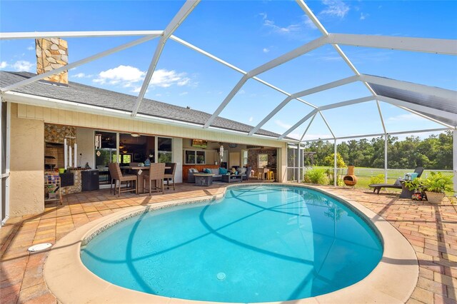 5600 Blackjack Ct S, Punta Gorda, FL 33982 - swimming pool with outdoor lounge area, a patio area, ceiling fan, and a lanai