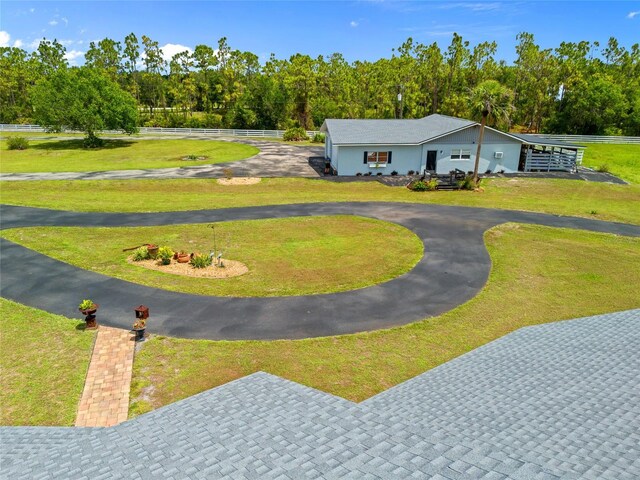 5600 Blackjack Ct S, Punta Gorda, FL 33982 - view of home's community featuring curved driveway