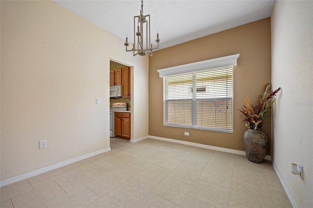 2747 Suncoast Lakes Blvd, Punta Gorda, FL 33980 - unfurnished room with a chandelier, baseboards, and light tile patterned flooring