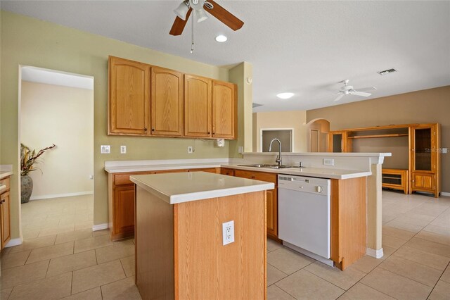 2747 Suncoast Lakes Blvd, Punta Gorda, FL 33980 - kitchen with white dishwasher, ceiling fan, a sink, light tile patterned flooring, and recessed lighting