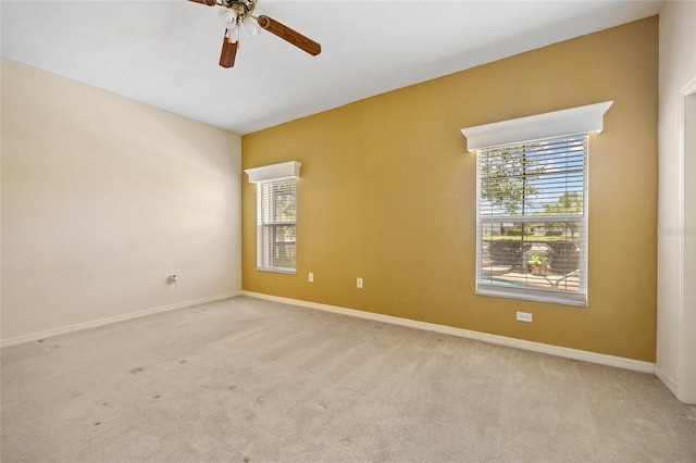 2747 Suncoast Lakes Blvd, Punta Gorda, FL 33980 - unfurnished room featuring plenty of natural light, carpet flooring, and ceiling fan