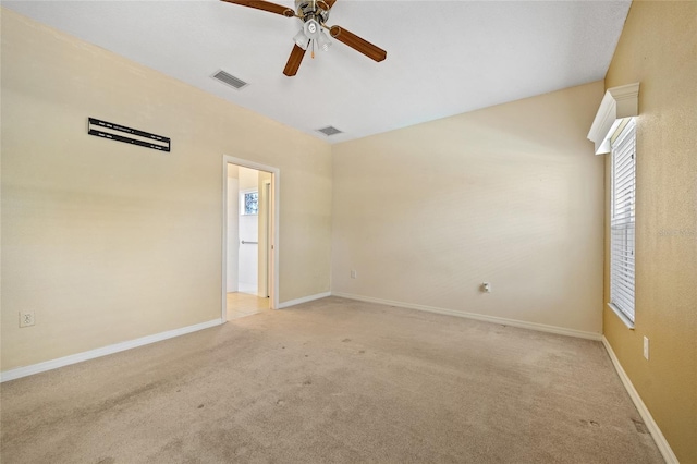 2747 Suncoast Lakes Blvd, Punta Gorda, FL 33980 - spare room with a ceiling fan, light colored carpet, and baseboards