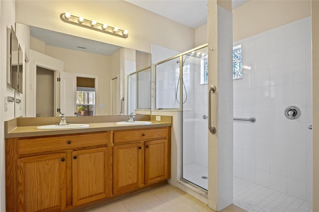 2747 Suncoast Lakes Blvd, Punta Gorda, FL 33980 - full bath featuring a shower stall, double vanity, and tile patterned floors