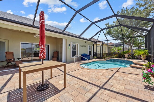 2747 Suncoast Lakes Blvd, Punta Gorda, FL 33980 - swimming pool with a patio area, glass enclosure, and ceiling fan