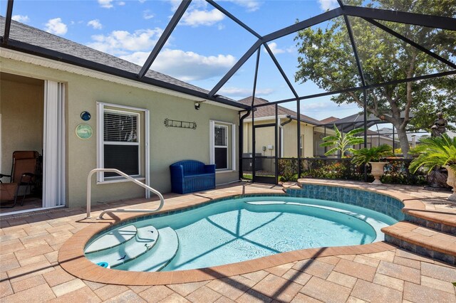 2747 Suncoast Lakes Blvd, Punta Gorda, FL 33980 - outdoor pool featuring a patio and glass enclosure