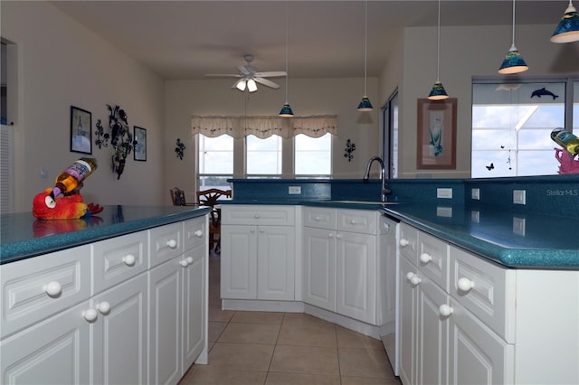 3772 Peace River Dr, Punta Gorda, FL 33983 - kitchen featuring a sink, dark countertops, a ceiling fan, and dishwasher