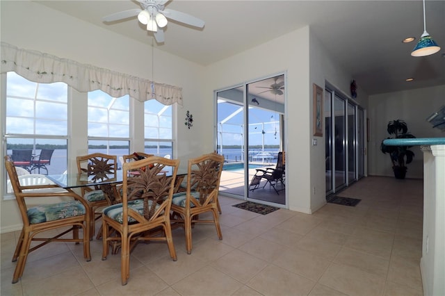 3772 Peace River Dr, Punta Gorda, FL 33983 - dining space featuring a ceiling fan, a sunroom, light tile patterned flooring, baseboards, and recessed lighting