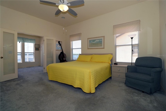 3772 Peace River Dr, Punta Gorda, FL 33983 - bedroom featuring carpet, multiple windows, and a ceiling fan