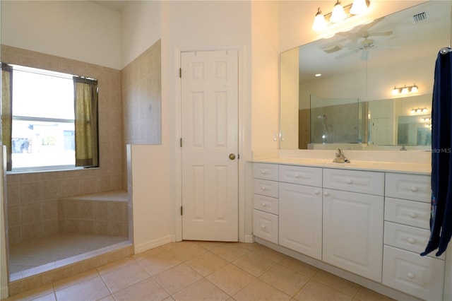 3772 Peace River Dr, Punta Gorda, FL 33983 - full bathroom with a ceiling fan, tile patterned flooring, vanity, and a shower