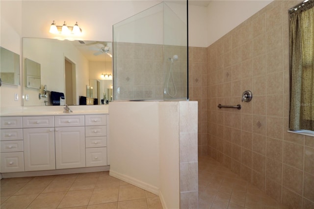 3772 Peace River Dr, Punta Gorda, FL 33983 - bathroom featuring a walk in shower, ceiling fan, vanity, and tile patterned floors