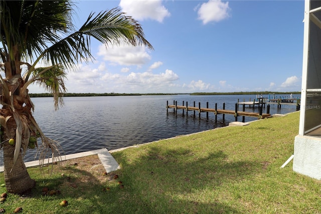 3772 Peace River Dr, Punta Gorda, FL 33983 - dock featuring a lawn and a water view