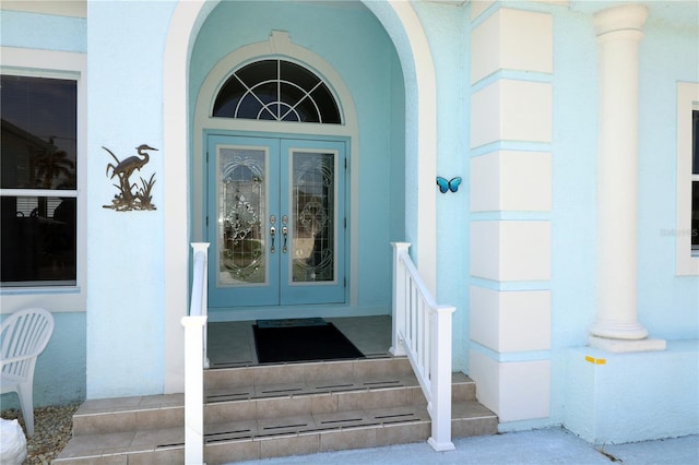 3772 Peace River Dr, Punta Gorda, FL 33983 - entrance to property featuring french doors and stucco siding