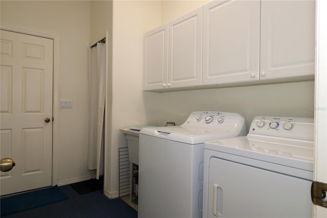 3772 Peace River Dr, Punta Gorda, FL 33983 - laundry room with washing machine and clothes dryer and cabinet space