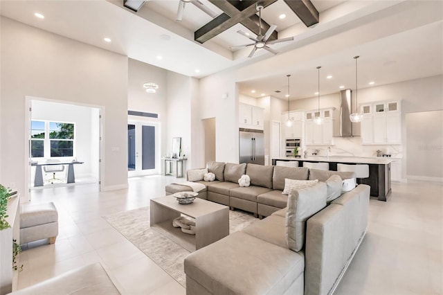 5061 Collingswood Blvd, Port Charlotte, FL 33948 - living area with a towering ceiling, coffered ceiling, beamed ceiling, recessed lighting, and ceiling fan