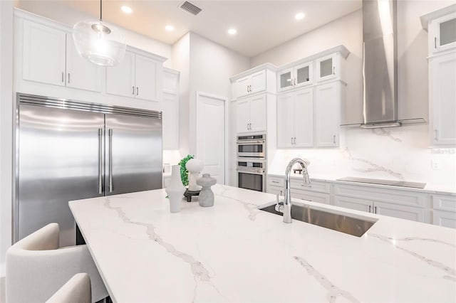 5061 Collingswood Blvd, Port Charlotte, FL 33948 - kitchen with stainless steel appliances, a sink, island range hood, white cabinetry, and recessed lighting