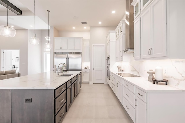 5061 Collingswood Blvd, Port Charlotte, FL 33948 - kitchen featuring a sink, white cabinets, stainless steel appliances, a large island with sink, and recessed lighting