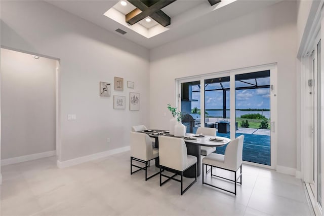 5061 Collingswood Blvd, Port Charlotte, FL 33948 - dining area with coffered ceiling, a high ceiling, beam ceiling, baseboards, and recessed lighting
