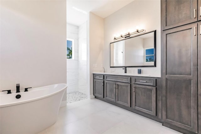 5061 Collingswood Blvd, Port Charlotte, FL 33948 - full bathroom featuring a soaking tub, vanity, and a tile shower