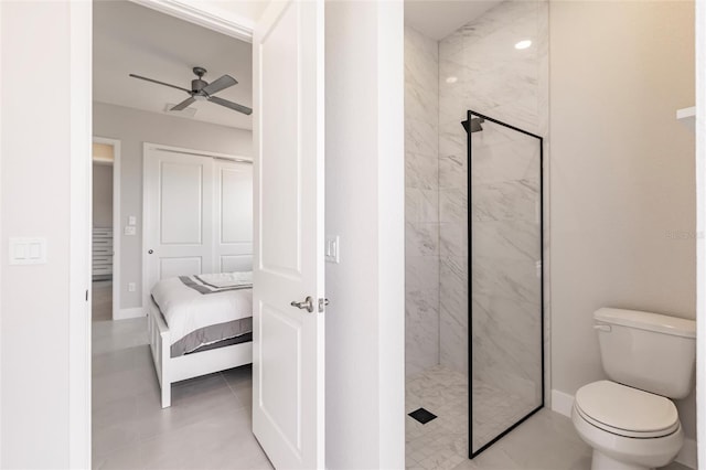 5061 Collingswood Blvd, Port Charlotte, FL 33948 - full bath with a marble finish shower, toilet, ceiling fan, and baseboards