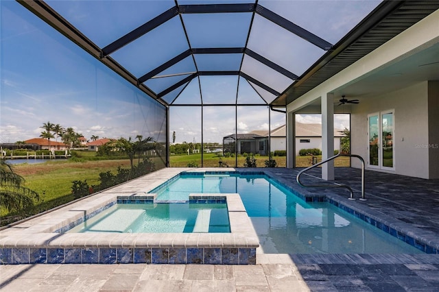 5061 Collingswood Blvd, Port Charlotte, FL 33948 - view of pool with a patio, a ceiling fan, a pool with connected hot tub, and a yard