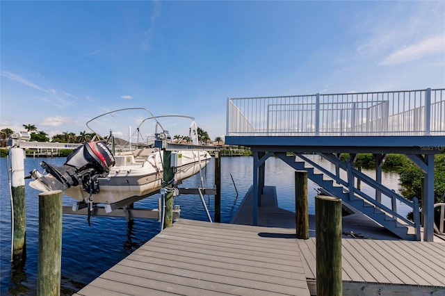 5061 Collingswood Blvd, Port Charlotte, FL 33948 - dock featuring boat lift and a water view