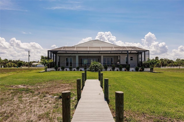 5061 Collingswood Blvd, Port Charlotte, FL 33948 - back of house with a yard and glass enclosure