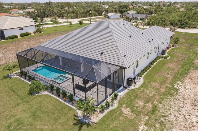 5061 Collingswood Blvd, Port Charlotte, FL 33948 - drone / aerial view of a pool area