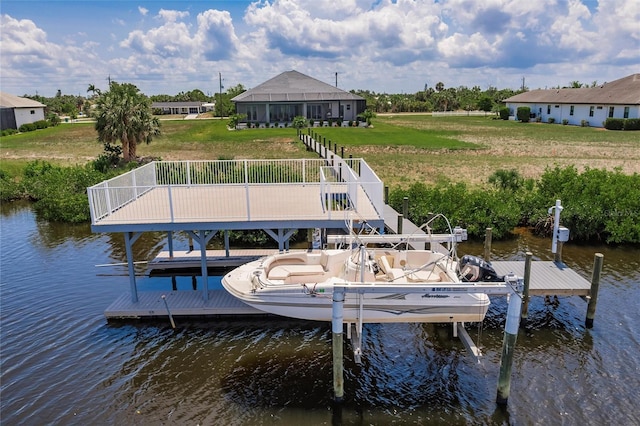 5061 Collingswood Blvd, Port Charlotte, FL 33948 - dock featuring a water view and a lawn