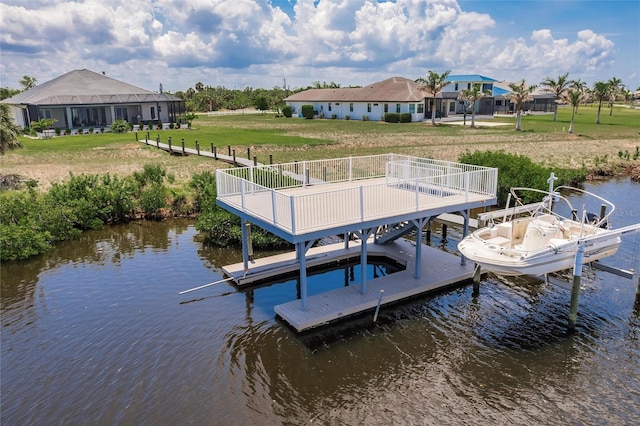 5061 Collingswood Blvd, Port Charlotte, FL 33948 - dock area featuring boat lift, a water view, and a lawn