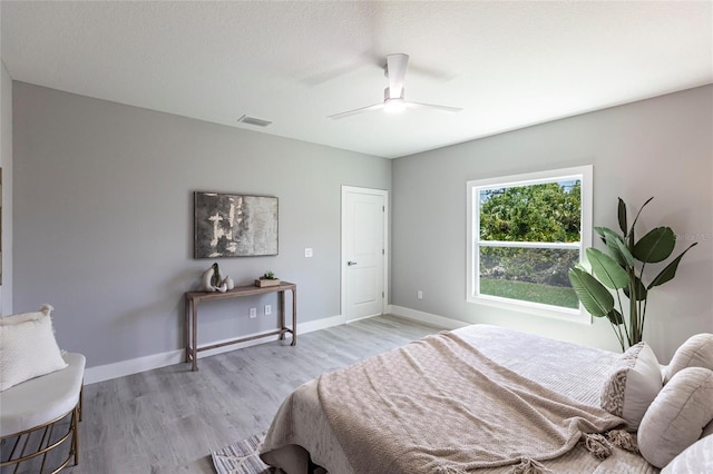 14350 Marlin Ave, Port Charlotte, FL 33953 - bedroom featuring light wood-style flooring, baseboards, and ceiling fan