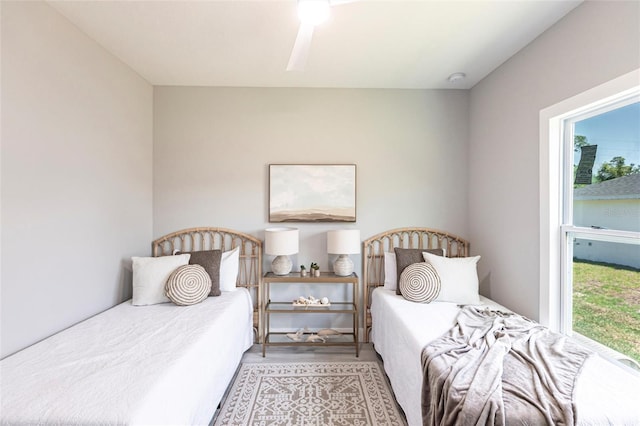 14350 Marlin Ave, Port Charlotte, FL 33953 - bedroom featuring multiple windows and wood finished floors