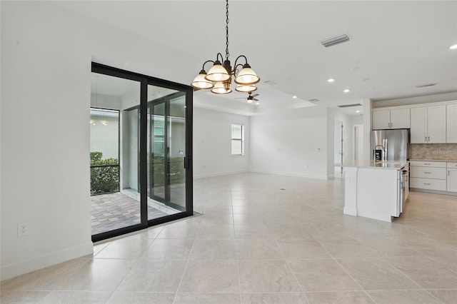 16053 Rosemallow Ln, Alva, FL 33920 - spare room featuring a chandelier, light tile patterned floors, recessed lighting, and baseboards